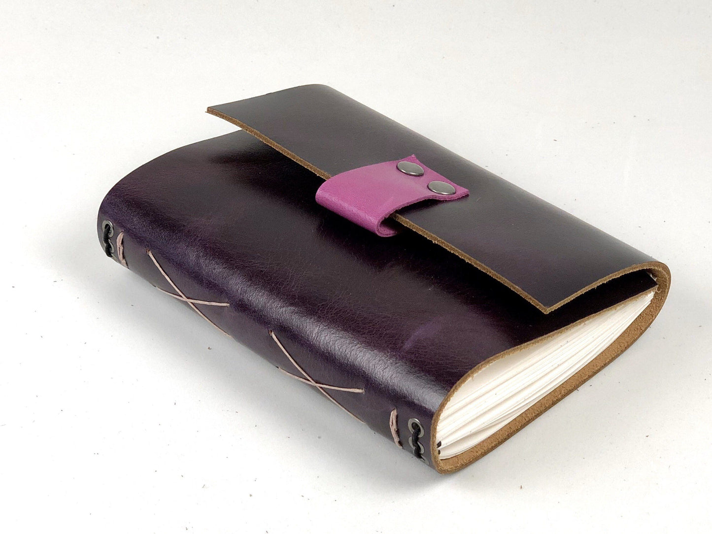small purple refillable journal angle view